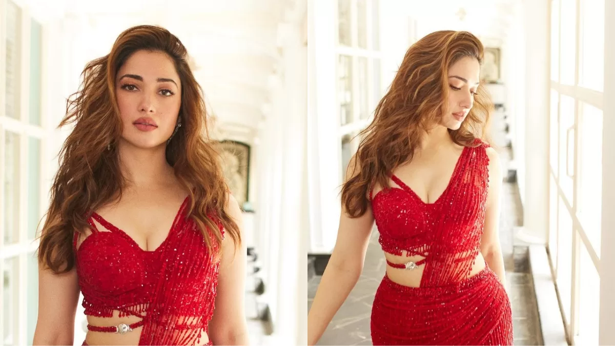 Tamannaah Bhatia Raises The Bar Of Sassiness In A Red Saree With A Thigh-High Slit!