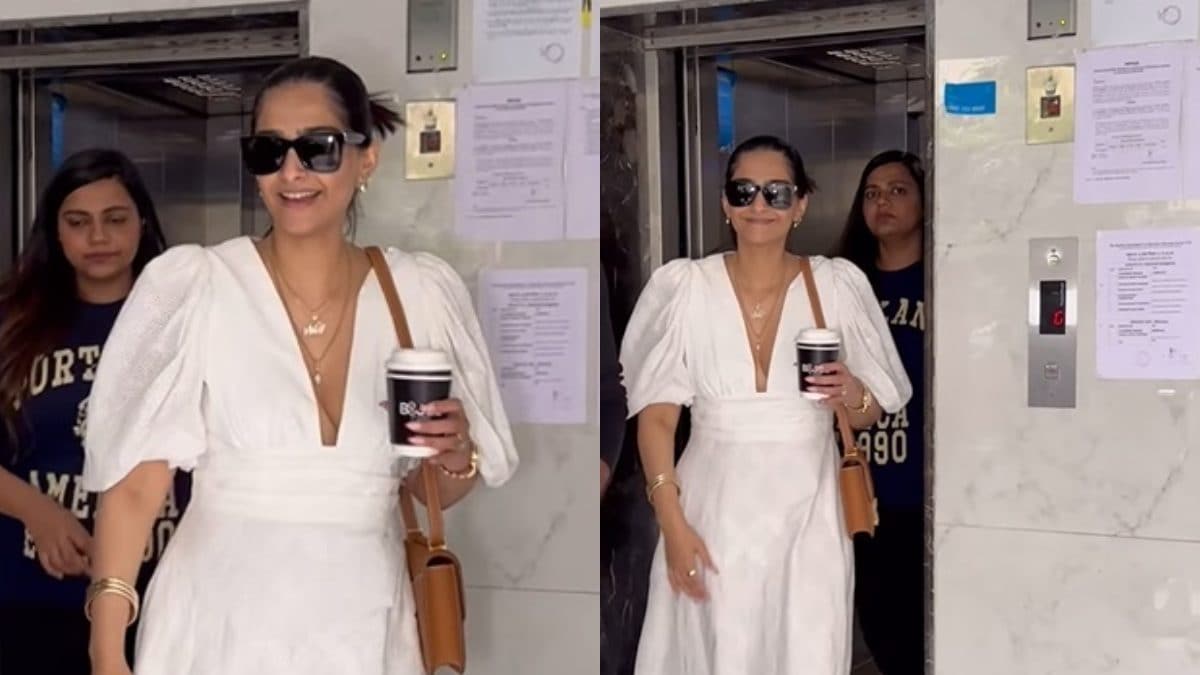 Sonam Kapoor Flashes Smile As She Gets Clicked In White Plunging Neckline Dress, Fans React; Watch