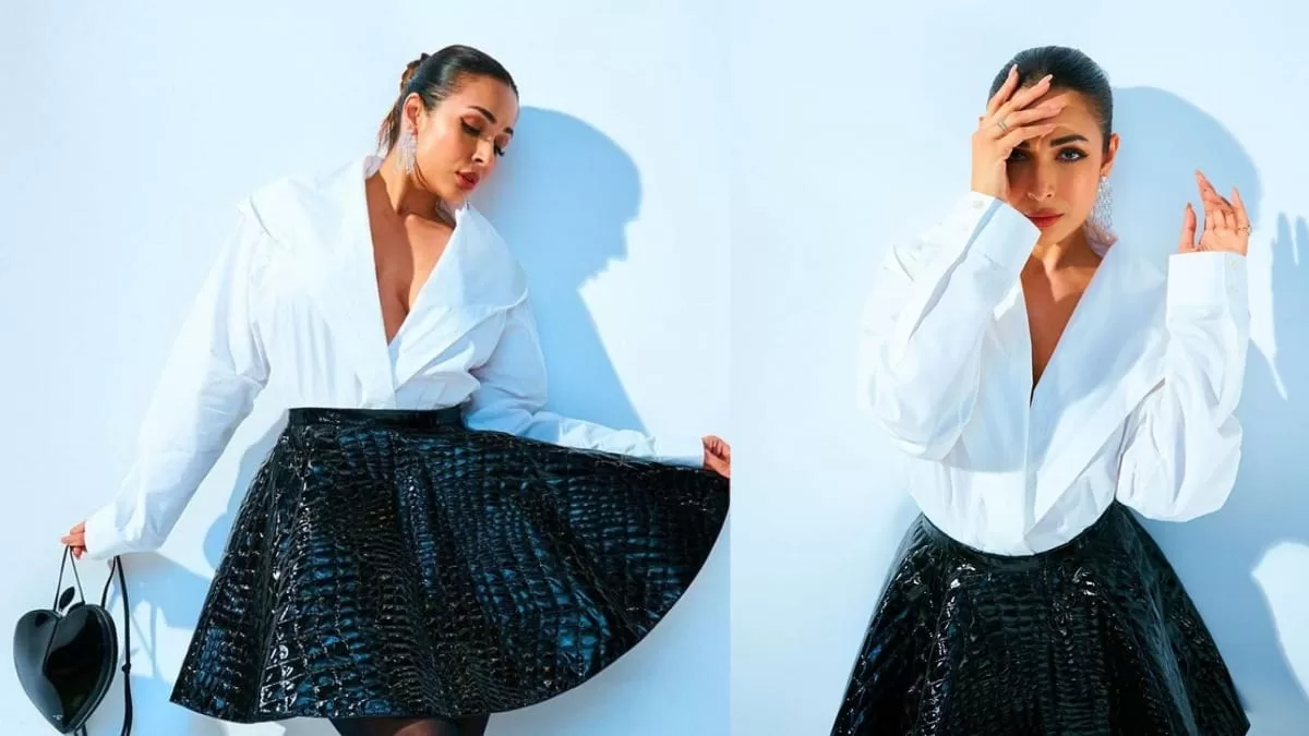 Malaika Arora Takes Party Wear To Next Level: Wears White Shirt With Crocodile Skater Skirt, Black Stockings!