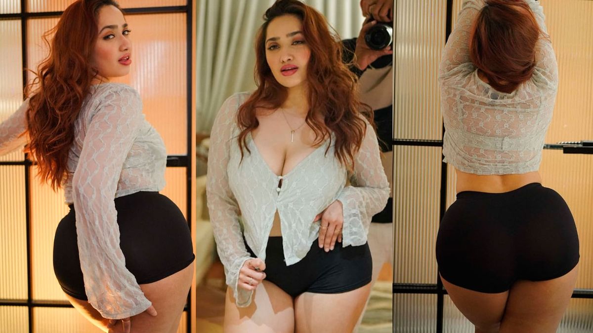Bigg Boss fame Aditi Mistry stuns in a sheer lace top and curve-hugging black tights –